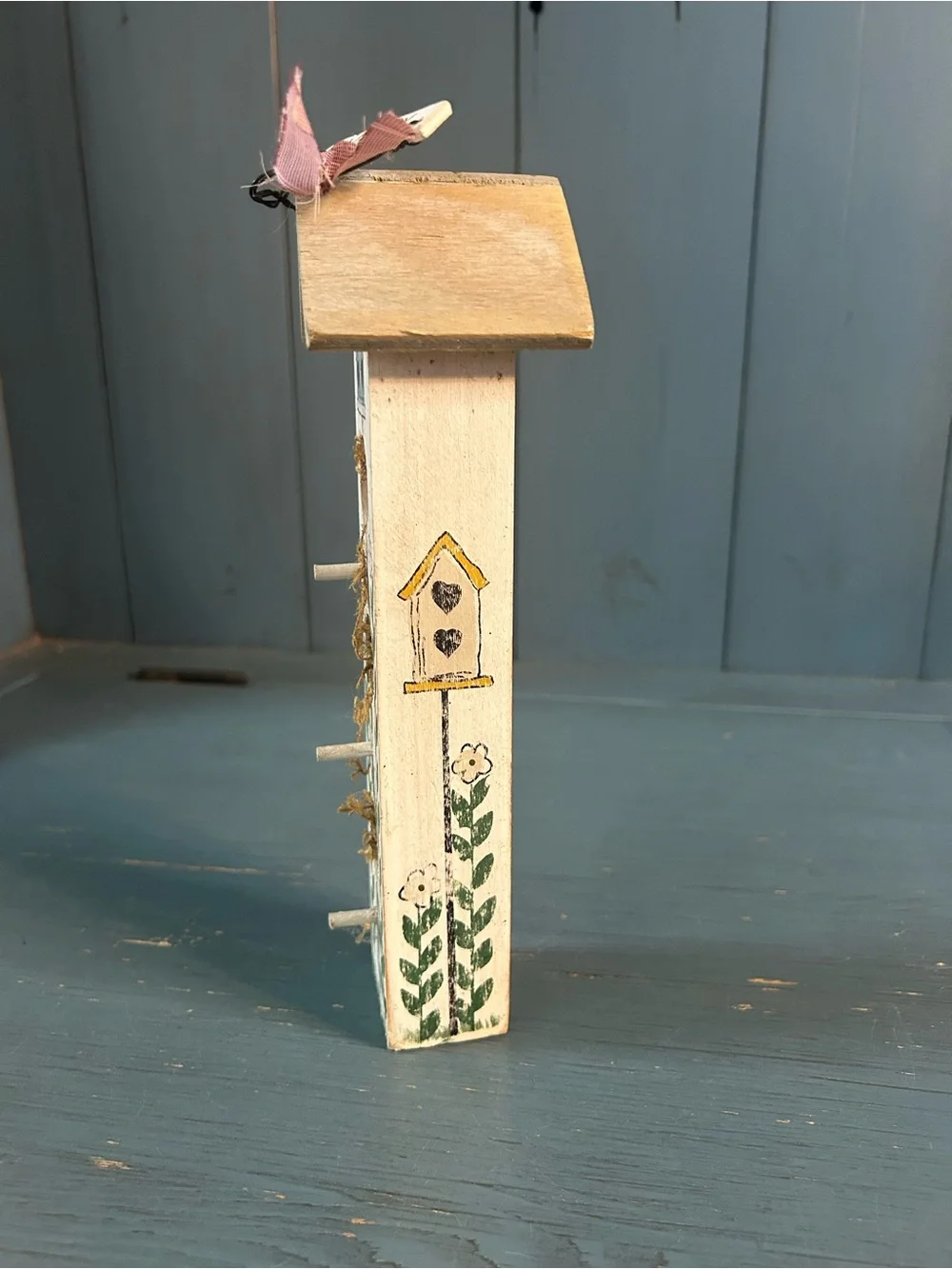 Hand Crafted White Birdhouse Wall Accent with Green Leaf and Pink Ribbon